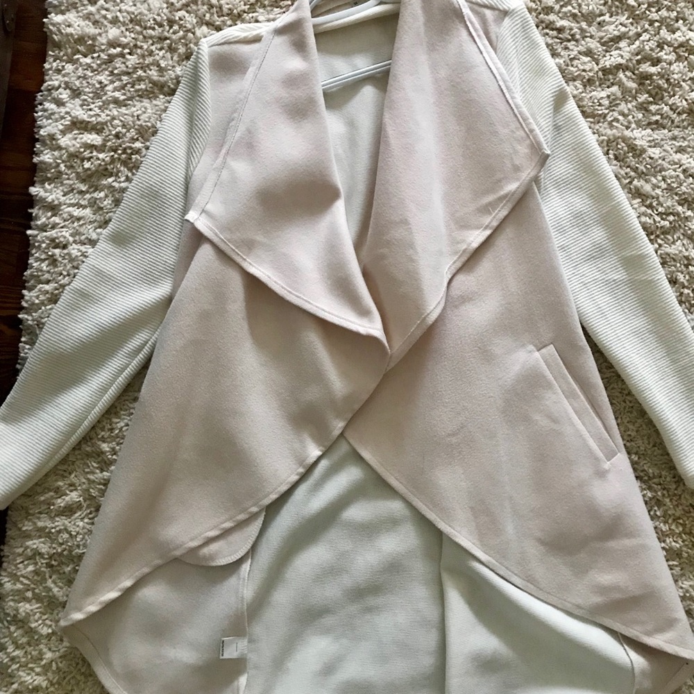 White sweater like jacket